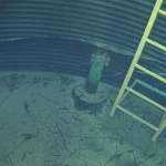 Remotely operated vehicle (ROV) inspecting the inside of a water tank