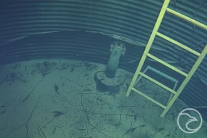 Remotely operated vehicle (ROV) inspecting the inside of a water tank