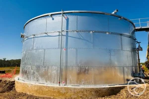 Visible structural damage on the wall of a water tank