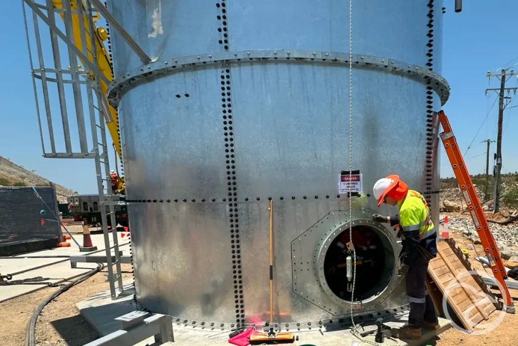 technician inspecting fire safety storage system